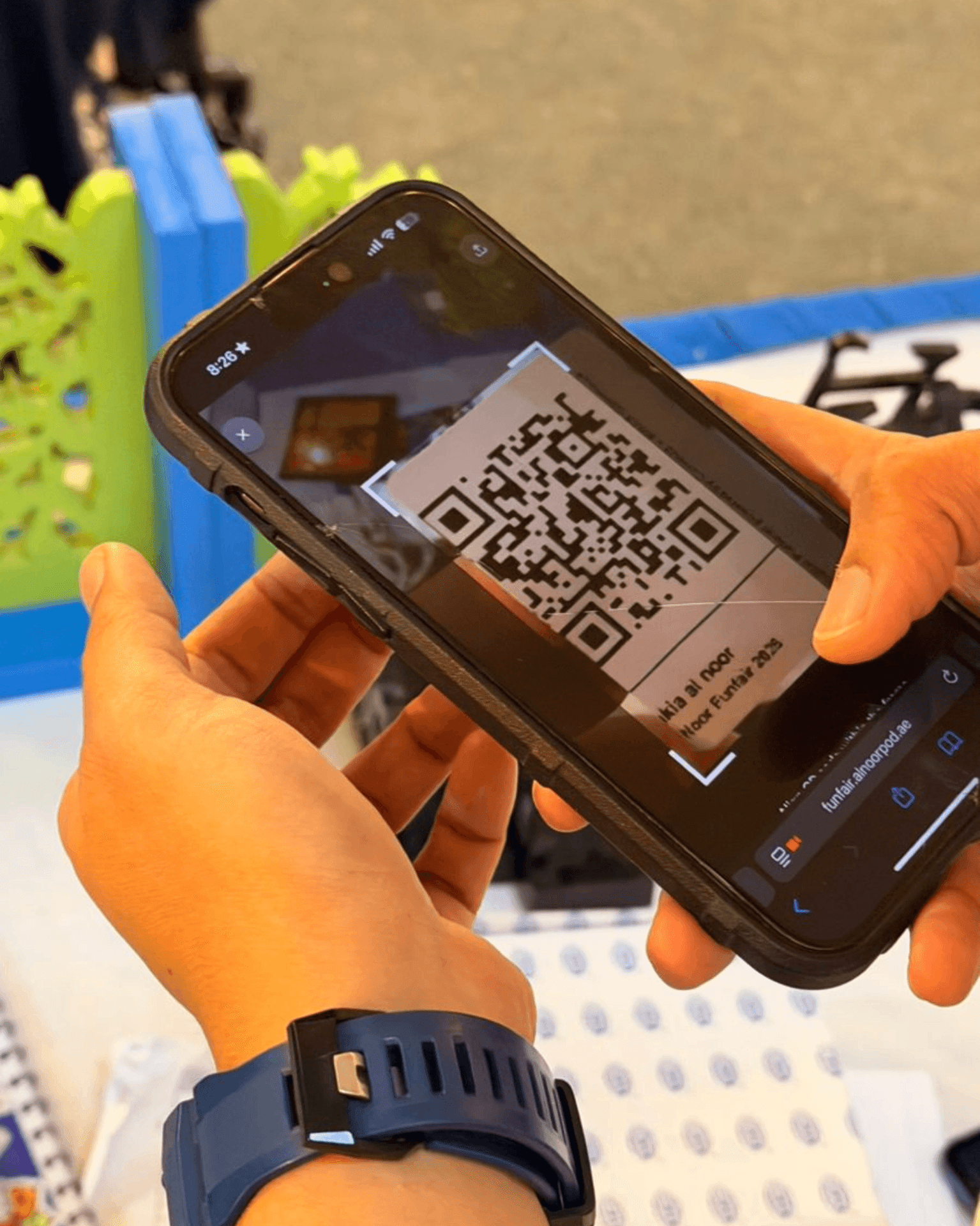 Mobile phone scanning visitor QR codes for instant redemption