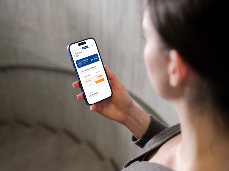 Vendor scanning visitor QR code for activity redemption